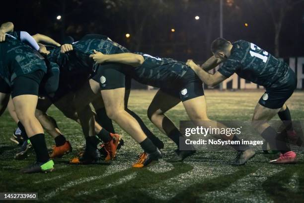 rugby team practicing scrum - ruck stock pictures, royalty-free photos & images