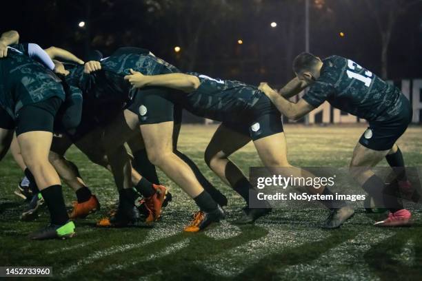 rugby team practicing scrum - rugby league scrum stock pictures, royalty-free photos & images