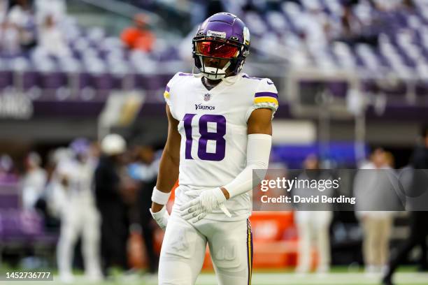 Justin Jefferson of the Minnesota Vikings warms up before the start of the game against the New York Giants at U.S. Bank Stadium on December 24, 2022...