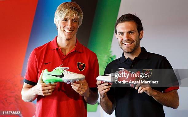 Fernando Torres and Juan Mata of Spain attend a press conference at Puerta America Hotel on May 25, 2012 in Madrid, Spain.