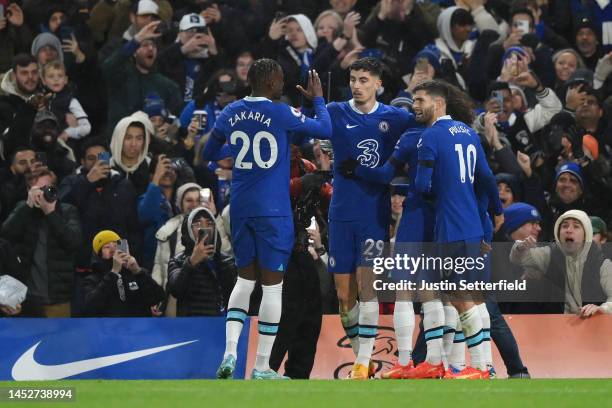 Kai Havertz of Chelsea celebrates after scoring their side's first goal with Denis Zakaria and Christian Pulisic during the Premier League match...