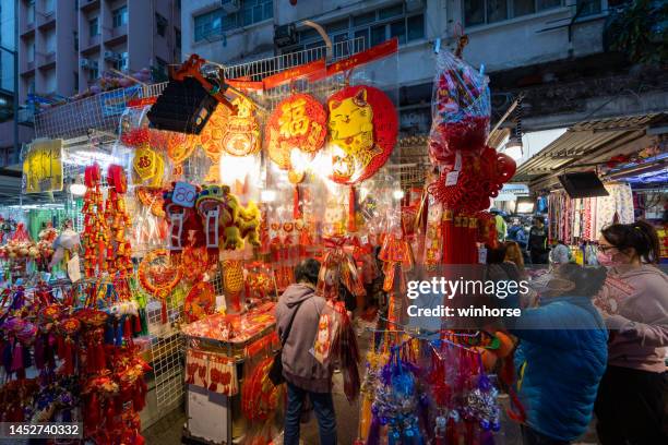 chinese prepare for year of the rabbit in hong kong - hong kong new year stock pictures, royalty-free photos & images