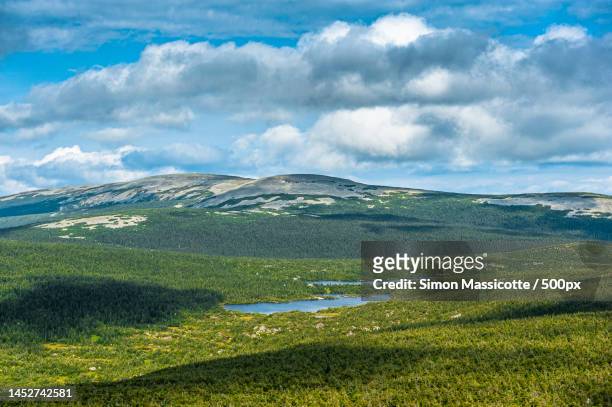scenic view of landscape against sky,quebec,canada - quebec landscape stock pictures, royalty-free photos & images