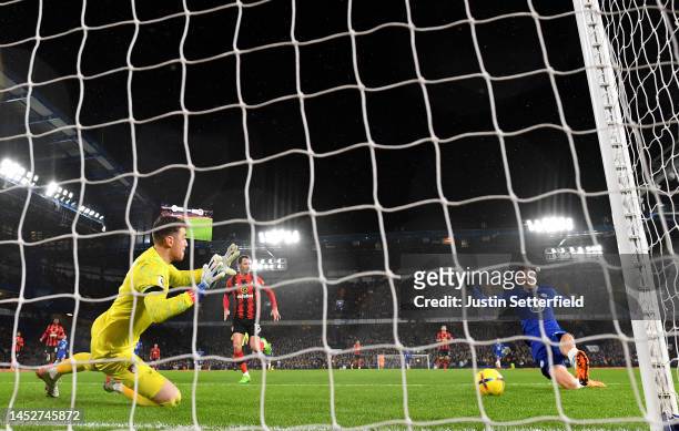 Kai Havertz of Chelsea scores their side's first goal past Mark Travers of AFC Bournemouth during the Premier League match between Chelsea FC and AFC...