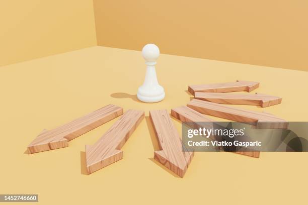 pawn standing in front of arrow symbols - 3d chess stock pictures, royalty-free photos & images