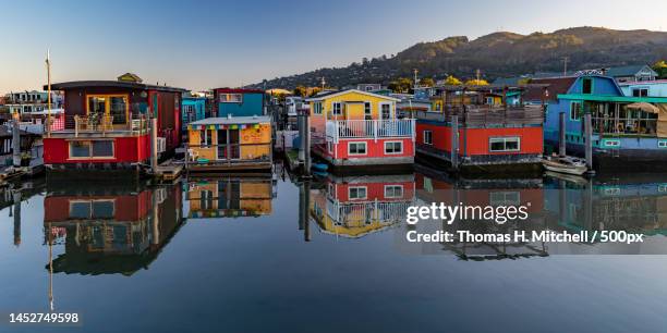 scenic view of lake by buildings against sky,charles van damme dock,united states,usa - sausalito ストックフォトと画像