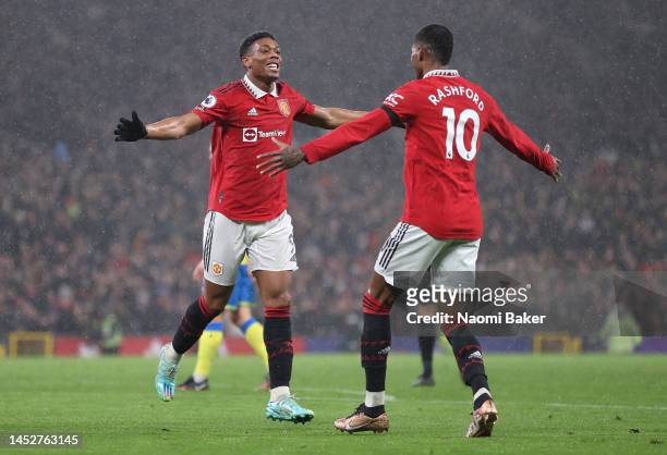 Anthony Martial of Manchester United celebrates after scoring their side's second goal with Marcus Rashford during the Premier League match between...