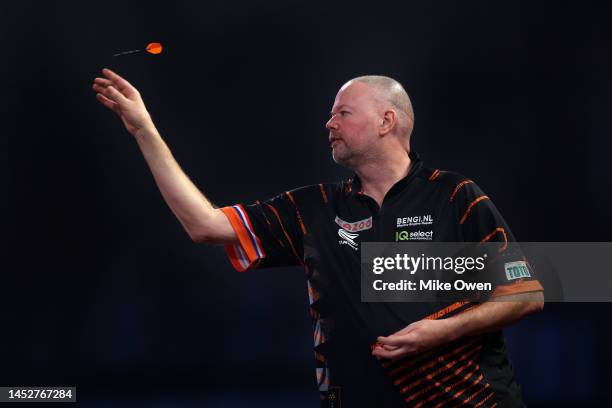 Raymond van Barneveld of Netherlands competes during his Third Round match against Gerwyn Price of Wales during Day Eight of The Cazoo World Darts...