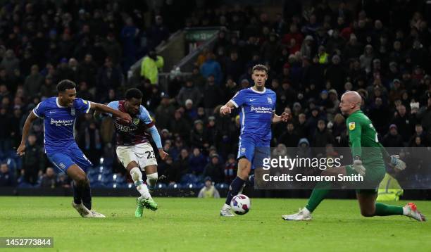 Nathan Tella of Burnley scores their side's third goal past John Ruddy of Birmingham City during the Sky Bet Championship between Burnley and...