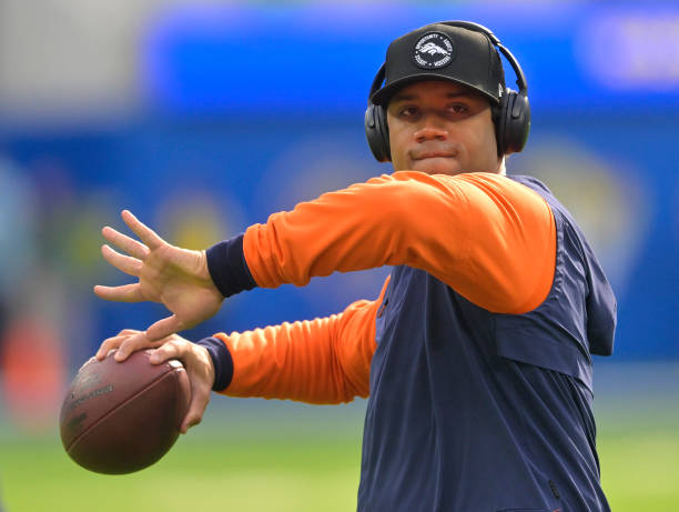 Russell Wilson of the Denver Broncos warms up for the game against the Los Angeles Rams at SoFi Stadium on December 25, 2022 in Inglewood, California.