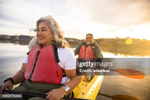 Senior Hispanic Couple Kayaking Senior Hispanic Couple Kayaking