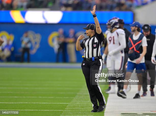 Line judge Maia Chaka talk on the field during the game between the Los Angeles Rams and the Denver Broncos at SoFi Stadium on December 25, 2022 in...