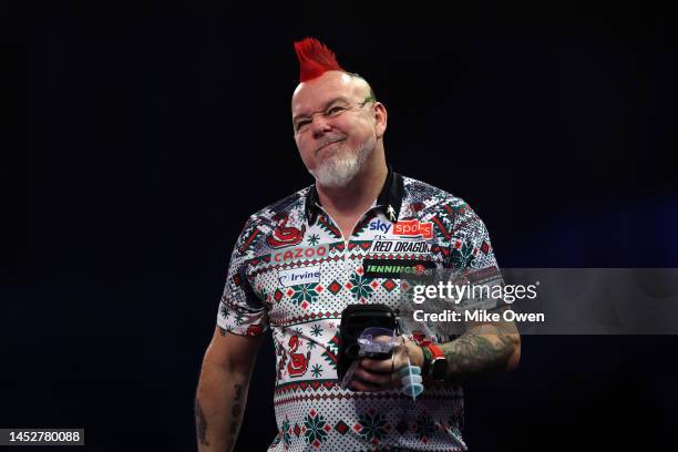 Peter Wright of Scotland talks off the stage after losing his Third Round match against Kim Huybrechts of Belgium during Day Eight of The Cazoo World...