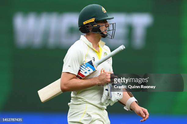 Pat Cummins of Australia leaves the field after getting dismissed during day three of the Second Test match in the series between Australia and South...