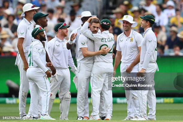 Anrich Nortje of South Africa is congratulated by team mates after dismissing David Warner of Australia during day three of the Second Test match in...