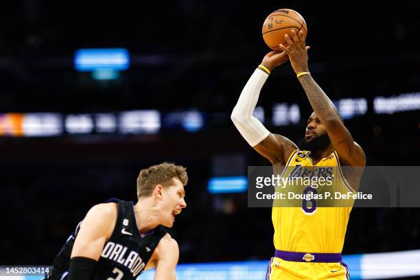 LeBron James of the Los Angeles Lakers looks to shoot the ball against the Orlando Magic during the third quarter at Amway Center on December 27,...