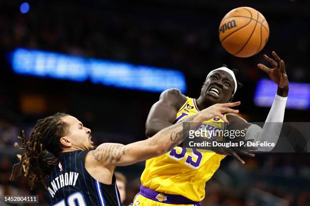 Wenyen Gabriel of the Los Angeles Lakers looks to shoot the ball as Cole Anthony of the Orlando Magic defends during the third quarter at Amway...