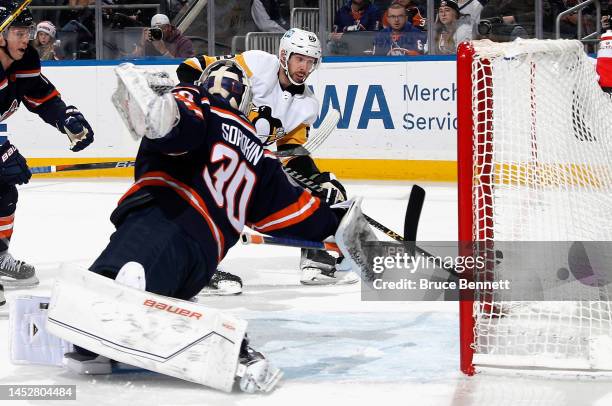 Ilya Sorokin of the New York Islanders makes the third period save on Marcus Pettersson of the Pittsburgh Penguins at the UBS Arena on December 27,...