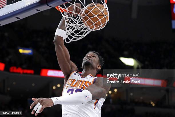 Deandre Ayton of the Phoenix Suns dunks during the second half against the Memphis Grizzlies at FedExForum on December 27, 2022 in Memphis,...