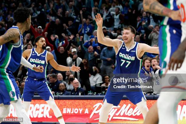 Luka Doncic of the Dallas Mavericks reacts after making the game tying basket against the New York Knicks with one second left in regulation to send...