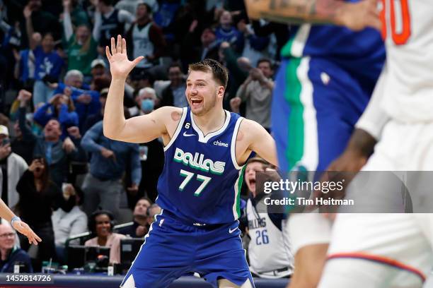 Luka Doncic of the Dallas Mavericks reacts after making the game tying basket against the New York Knicks with one second left in regulation to send...