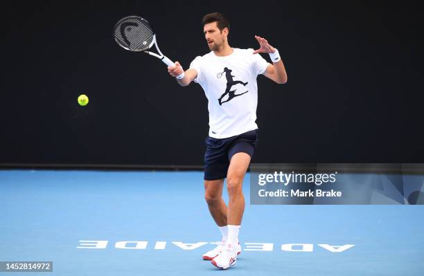 Novak Djokovic plays a forehand on centre court during a media opportunity ahead of the 2023 Adelaide International at Memorial Drive on December 28,...