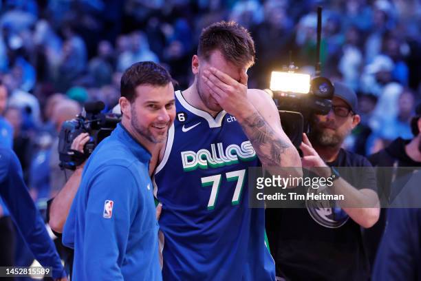 Luka Doncic of the Dallas Mavericks walks off the court after defeating the New York Knicks in overtime at American Airlines Center on December 27,...