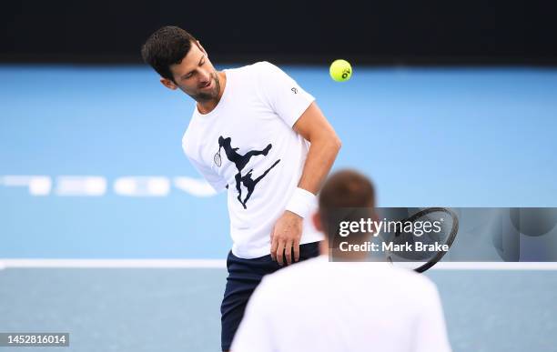 Novak Djokovic playing a relaxed warm-up with his training team during a media opportunity ahead of the 2023 Adelaide International at Memorial Drive...