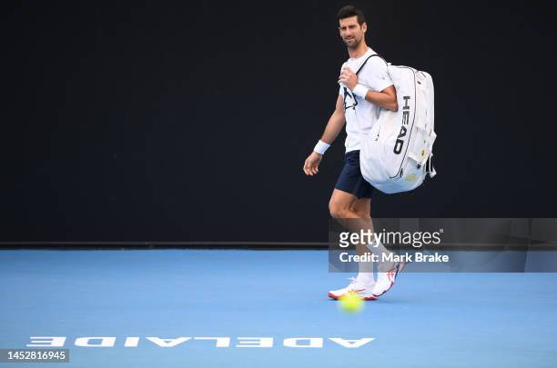 Novak Djokovic arrives on centre court during a media opportunity ahead of the 2023 Adelaide International at Memorial Drive on December 28, 2022 in...