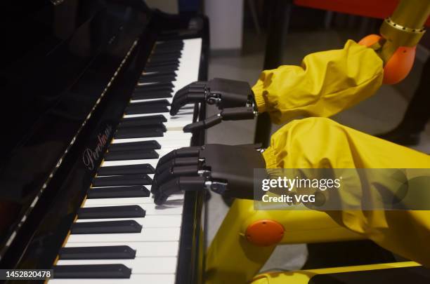 Humanoid robot plays piano at a restaurant on December 28, 2022 in Hangzhou, Zhejiang Province of China.