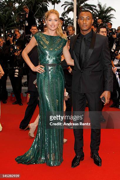 Model Doutzen Kroes and Sunnery James attend the "Cosmopolis" premiere during the 65th Annual Cannes Film Festival at Palais des Festivals on May 25,...