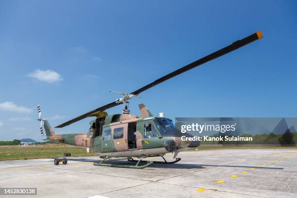 the army helicopter parking at the hangar and preparing to take off - tranquility base stock pictures, royalty-free photos & images