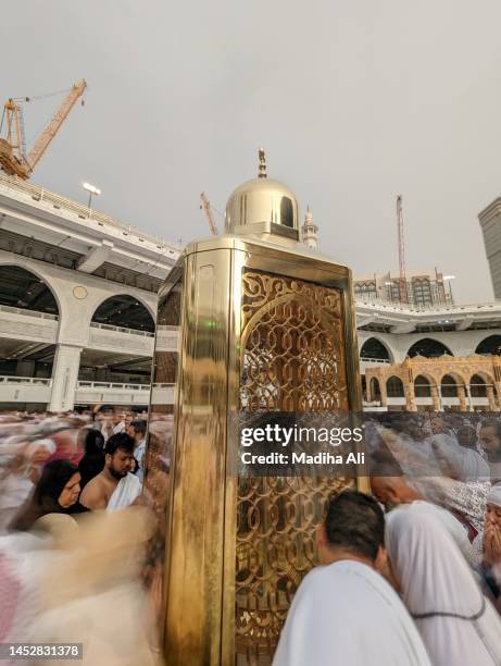 station of abraham or maqam e ibrahim inside masjid al haram where pilgrims do tawaaf of khaana kaaba for hajj and umrah | people wear ihram clothes for haj and umra, mecca, saudi arabia | prophet ibraheem - maqam ibrahim stock pictures, royalty-free photos & images