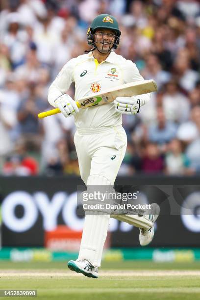 Alex Carey of Australia celebrates his century whilst running during day three of the Second Test match in the series between Australia and South...