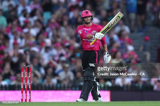 Josh Philippe of the Sixers celebrates after reaching their half century during the Men's Big Bash League match between the Sydney Sixers and the...
