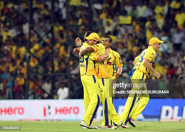 Chennai Super Kings batsman Murali Vijay celebrates with his team mates after the dismissal of David Warner during the IPL Twenty20 cricket 2nd...