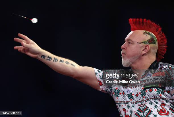Peter Wright of Scotland competes during his Third Round match against Kim Huybrechts of Belgium during Day Eight of The Cazoo World Darts...