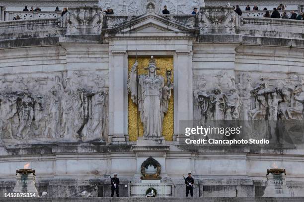 Two Italian soldiers guard the tomb of the "Unknown Soldier, Milite Ignoto" at the Altare della Patria in the historic center of Rome on December 27,...