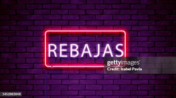 rebajas message in neon lights - fluorescent light font stock pictures, royalty-free photos & images