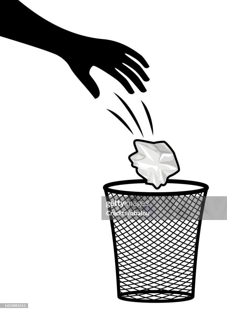 Human Hand Throws a Crumpled Paper in Trash