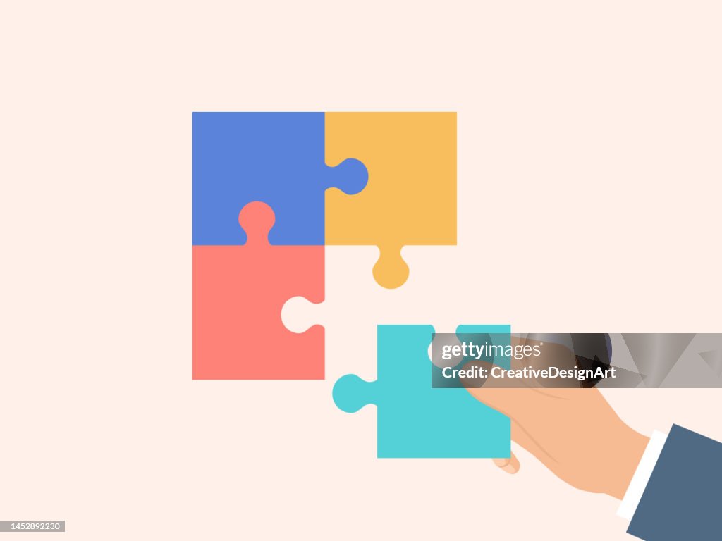 Geschäftsmann Hand Putting fehlendes Puzzleteil