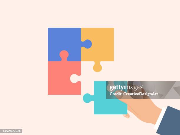 bildbanksillustrationer, clip art samt tecknat material och ikoner med businessman hand putting missing jigsaw piece - hand tool