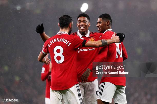 Anthony Martial of Manchester United celebrates with Marcus Rashford after scoring their side's second goal during the Premier League match between...