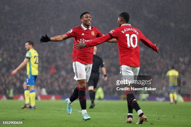 Anthony Martial of Manchester United celebrates with Marcus Rashford after scoring their side's second goal during the Premier League match between...