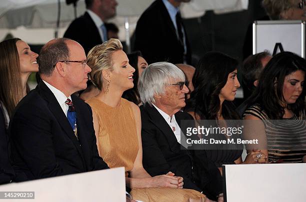 Prince Albert II of Monaco, Princess Charlene of Monaco, F1 Supremo Bernie Ecclestone, Fabiana Flosi and designer Daniella Issa Helayel attend the...