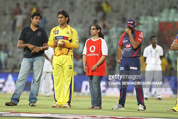 Chennai Super Kings MS Dhoni stands alongside Delhi Daredevils Captain Virender Sehwag during the IPL Twenty20 cricket 2nd Qualifying match, between...