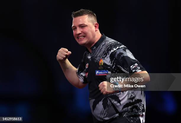 Chris Dobey of England celebrates the win during his Third Round match against Gary Anderson of Scotland during Day Nine of The Cazoo World Darts...