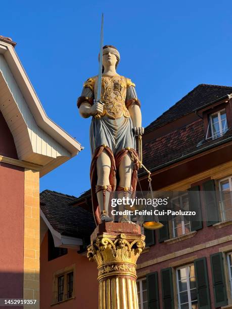 high section of fontaine de la justice at old town of biel - briel foto e immagini stock