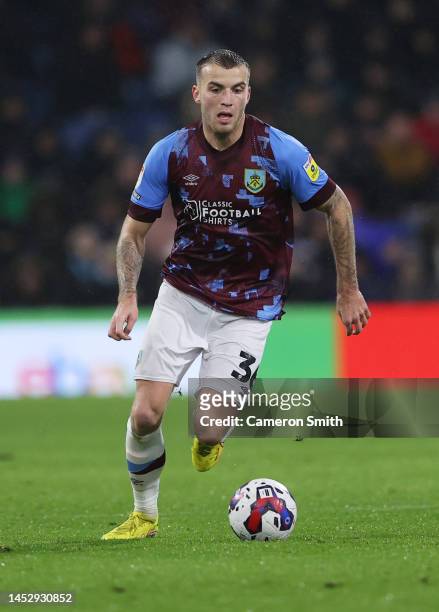 Jordan Beyer of Burnley runs with the ball during the Sky Bet Championship between Burnley and Birmingham City at Turf Moor on December 27, 2022 in...