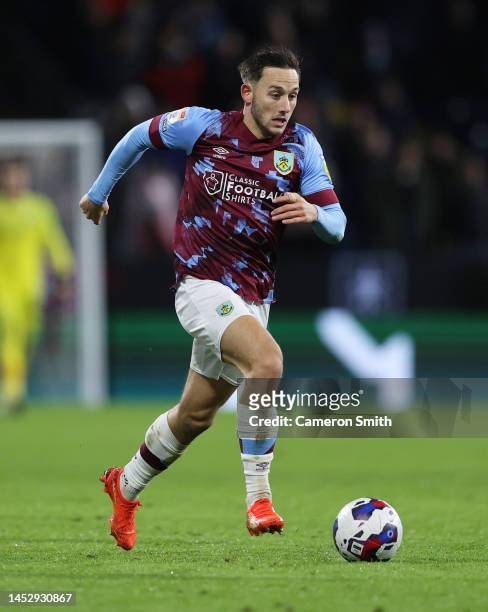 Josh Brownhill of Burnley runs with the ball during the Sky Bet Championship between Burnley and Birmingham City at Turf Moor on December 27, 2022 in...
